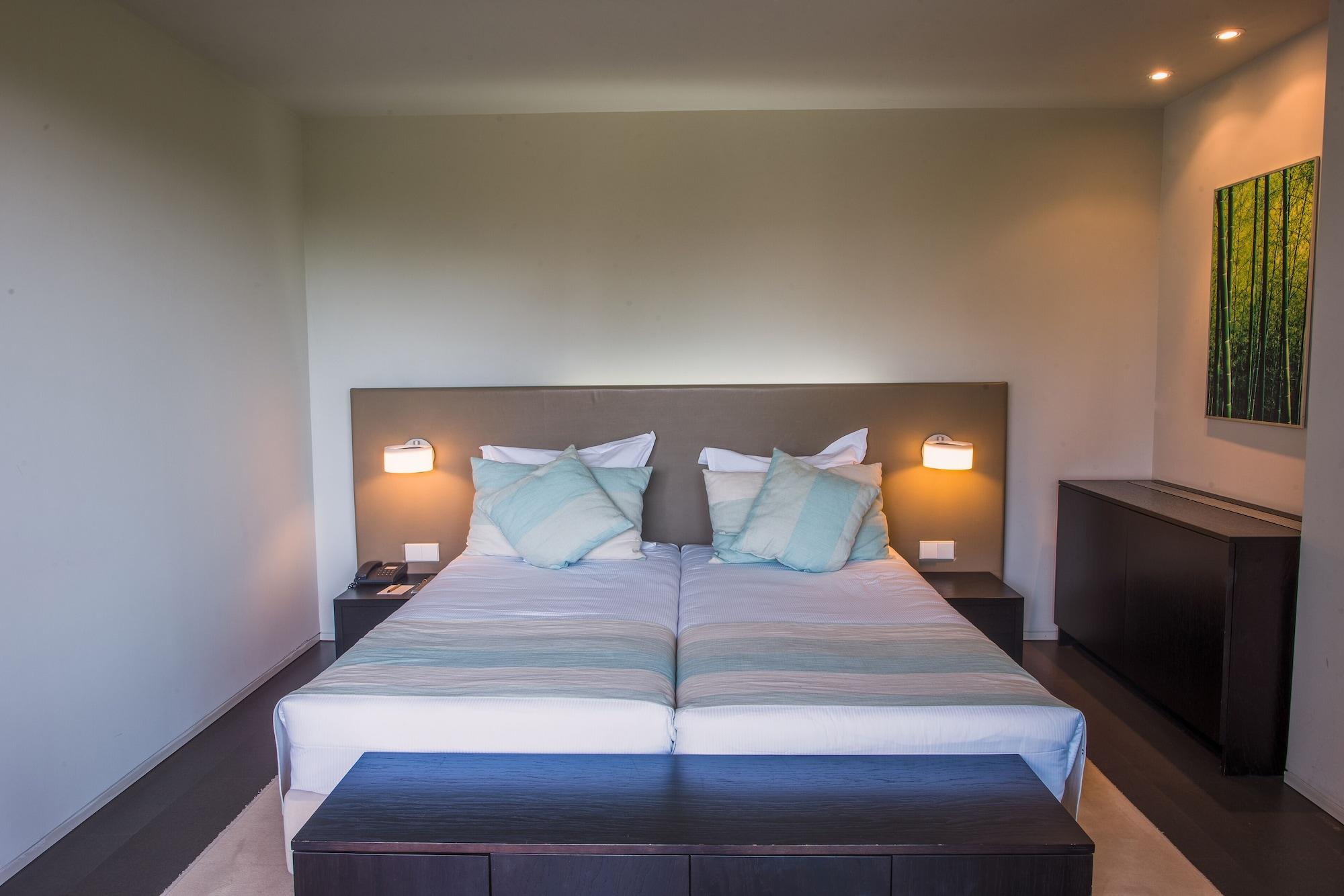 アクアルズ トロイア ラゴア ホテル&アパートメンツ S ホテルズ コレクション エクステリア 写真 A bedroom at the hotel