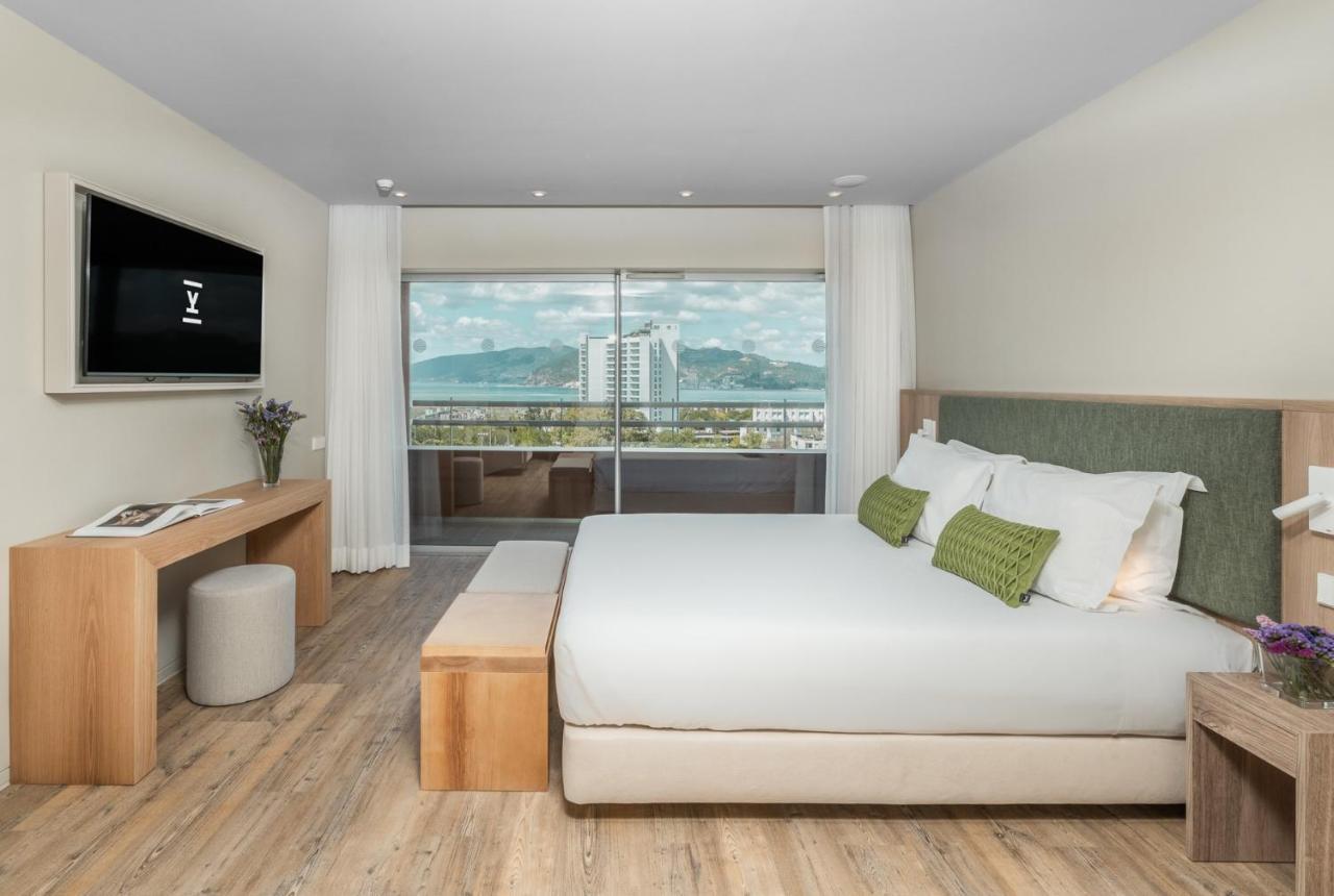 アクアルズ トロイア ラゴア ホテル&アパートメンツ S ホテルズ コレクション エクステリア 写真 A bedroom at the hotel